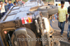 A Bolero vehicle overturns on the highway at Adyar.